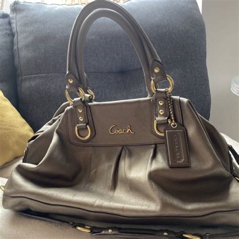 cartera de mano coach original precio